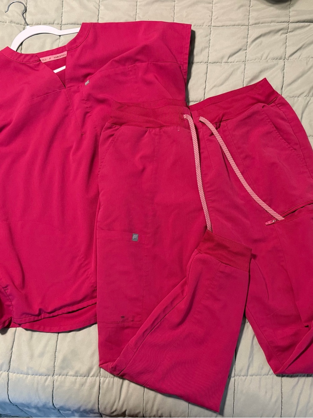 Woman’s Fabletics Hot Pink Scrub set